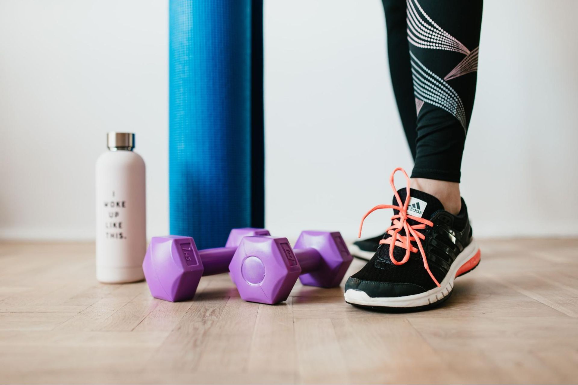 Purple dumbbells with women shoes