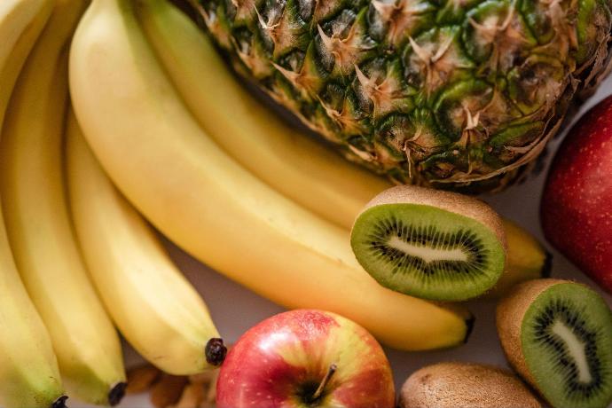 Variety of fruits from banana to pineapple rich in Potassium