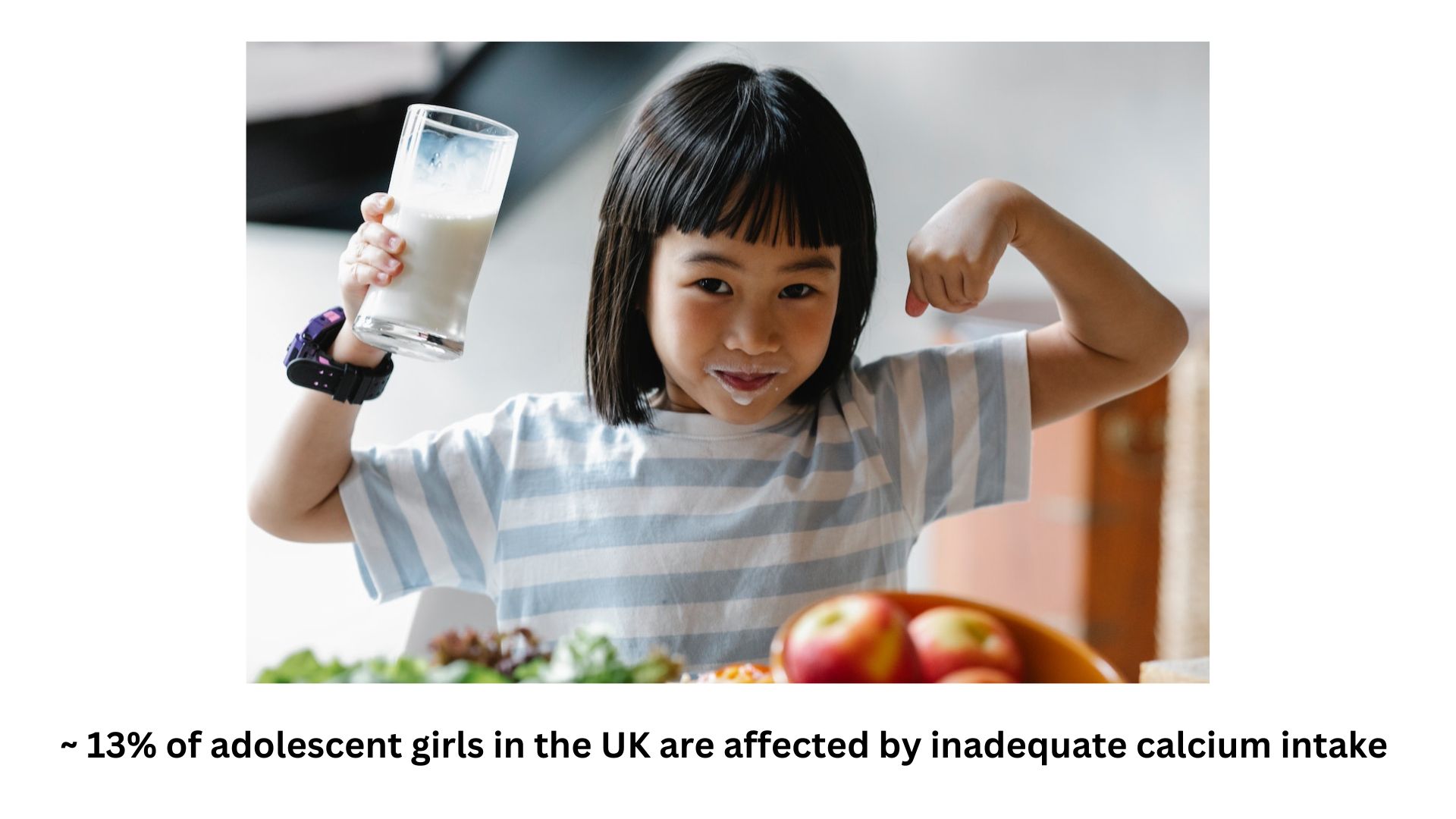 A child girl drinking milk 