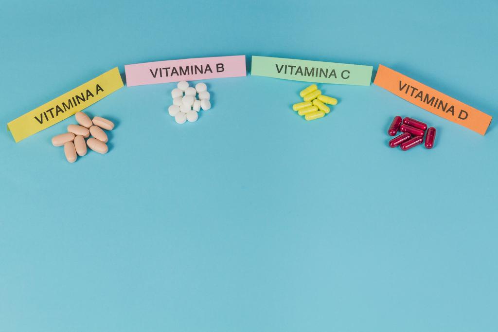 Group of tablets and capsules showing different Vitamins