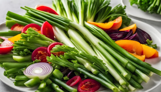 A variety of different vegetables including green onion leaves