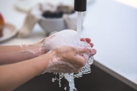 Person washing hands