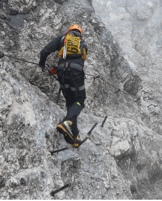 Man climbing mountain